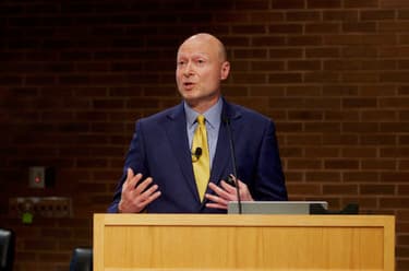 Mitch Zamoff presenting at a podium